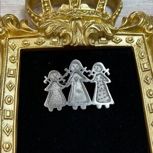 “Three Sisters" pewter brooch pin designed by Cynthia Webb